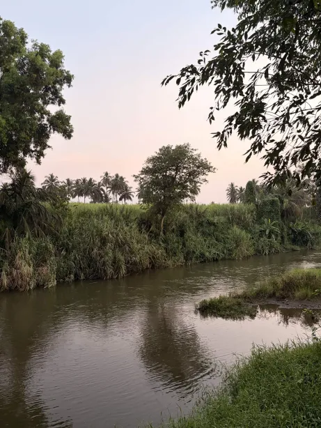 Serene riverside setting at Lokavana